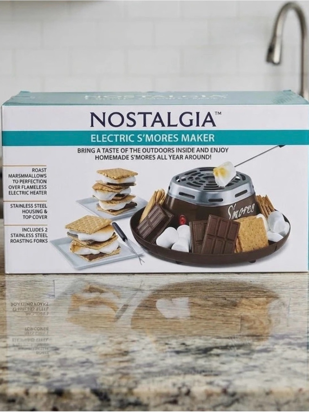 Nostalgia Electric S'mores Maker in brown and teal packaging